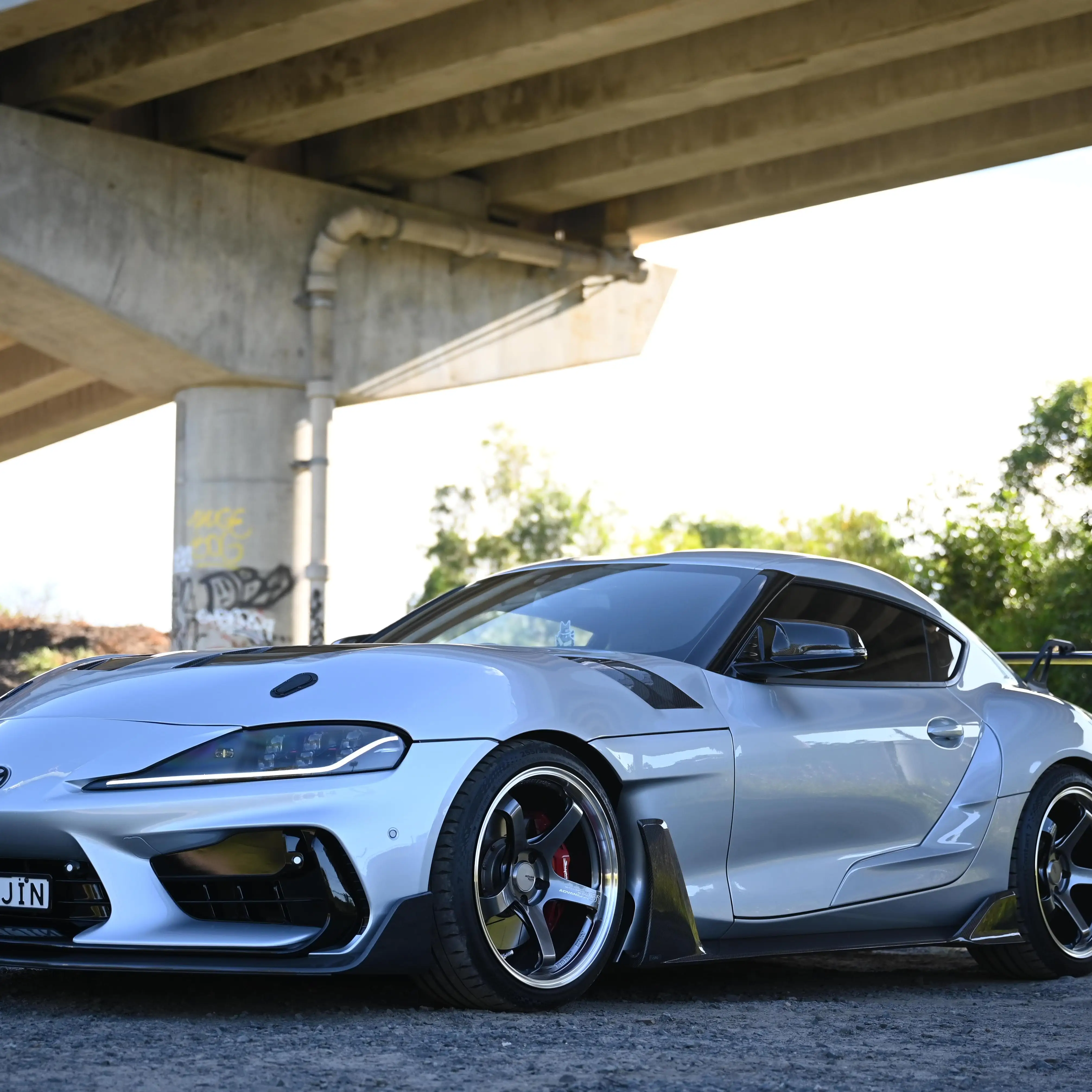 Toyota GR Supra in workshop getting 19-inch Yokohama Advan GT Beyond Hyper Platinum Black wheels installed at KA Autosport