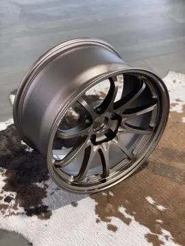 Showroom display of a high performance Japanese forged 18 inch Volk Racing CE28 N-Plus wheel in signature matte Bronze