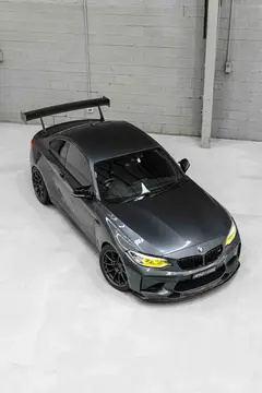 BMW F87 M2 on track running 19-inch RAYS Volk Racing ZE40 wheels in Diamond Dark Gunmetal
