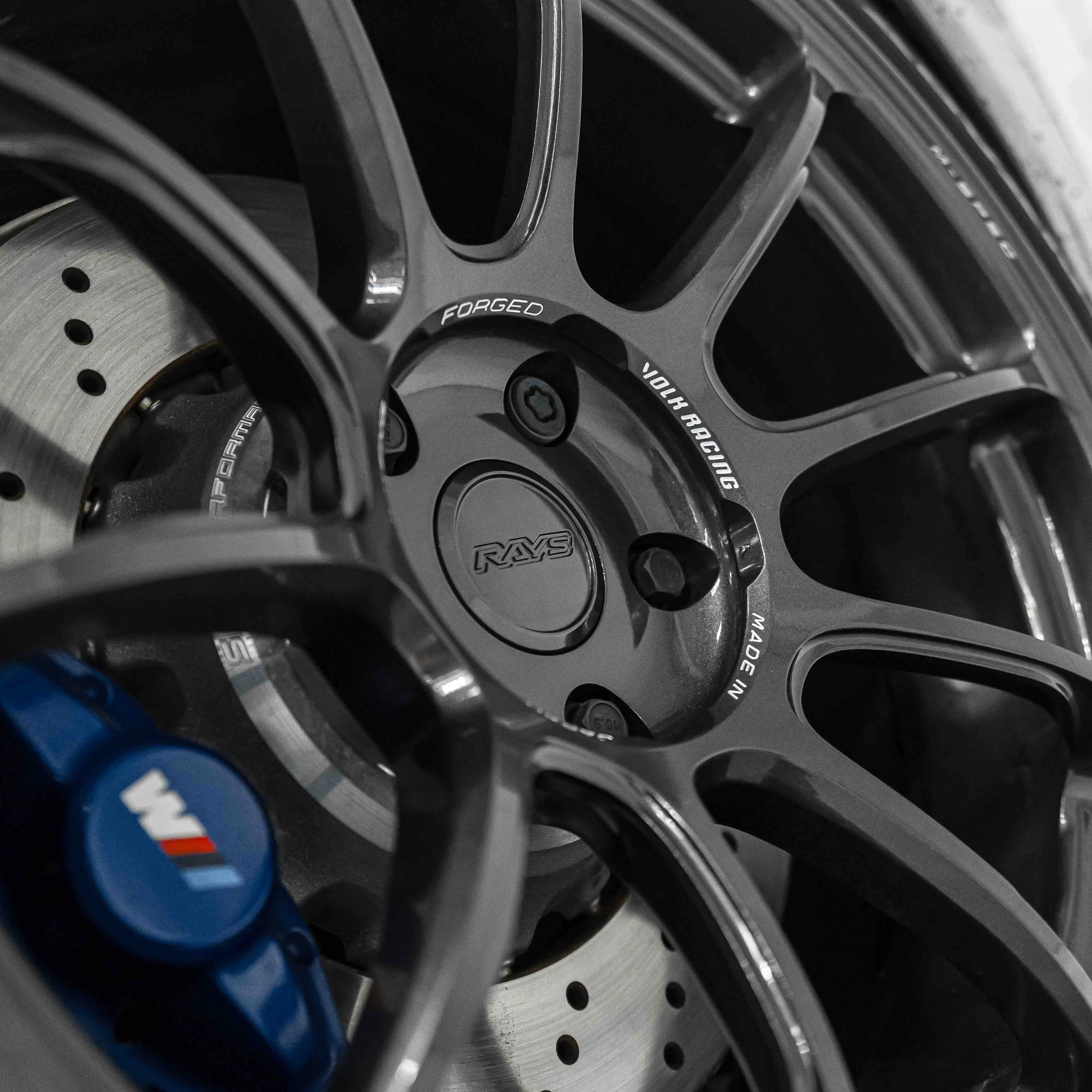 M Performance brake caliper clearance behind 19-inch RAYS Volk Racing ZE40 wheel in Diamond Dark Gunmetal