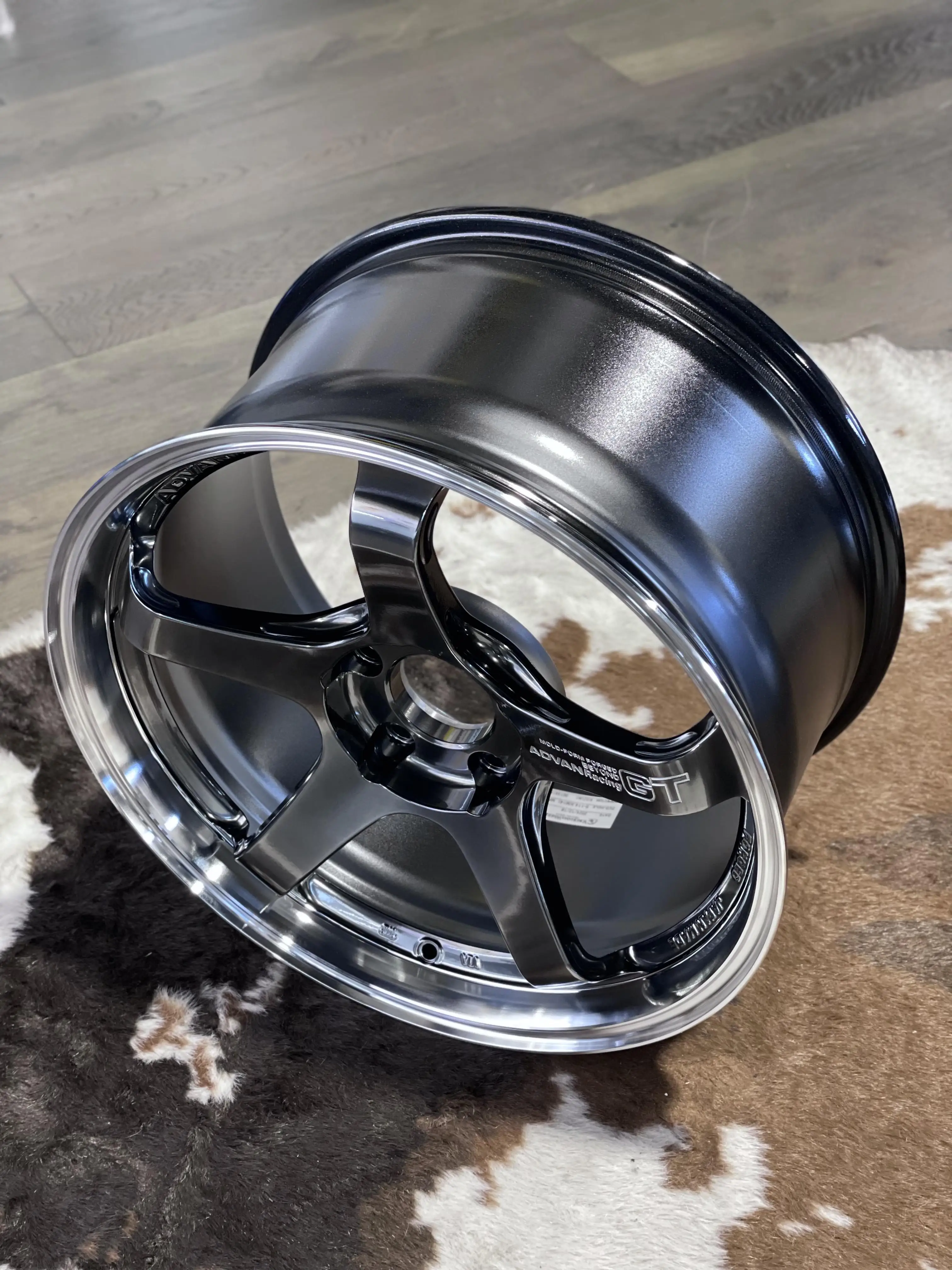 Low angle presentation highlighting the large brake clearance barrel structure of a premium forged ADVAN GT Beyond