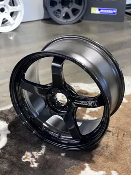 Three quarter studio view highlighting the thick concave five spoke layout of a TBK Advan GT Beyond wheel