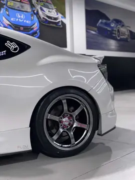 White Toyota GT86 sports coupe showcasing an aggressive street stance on Grace Silver 57DR wheels