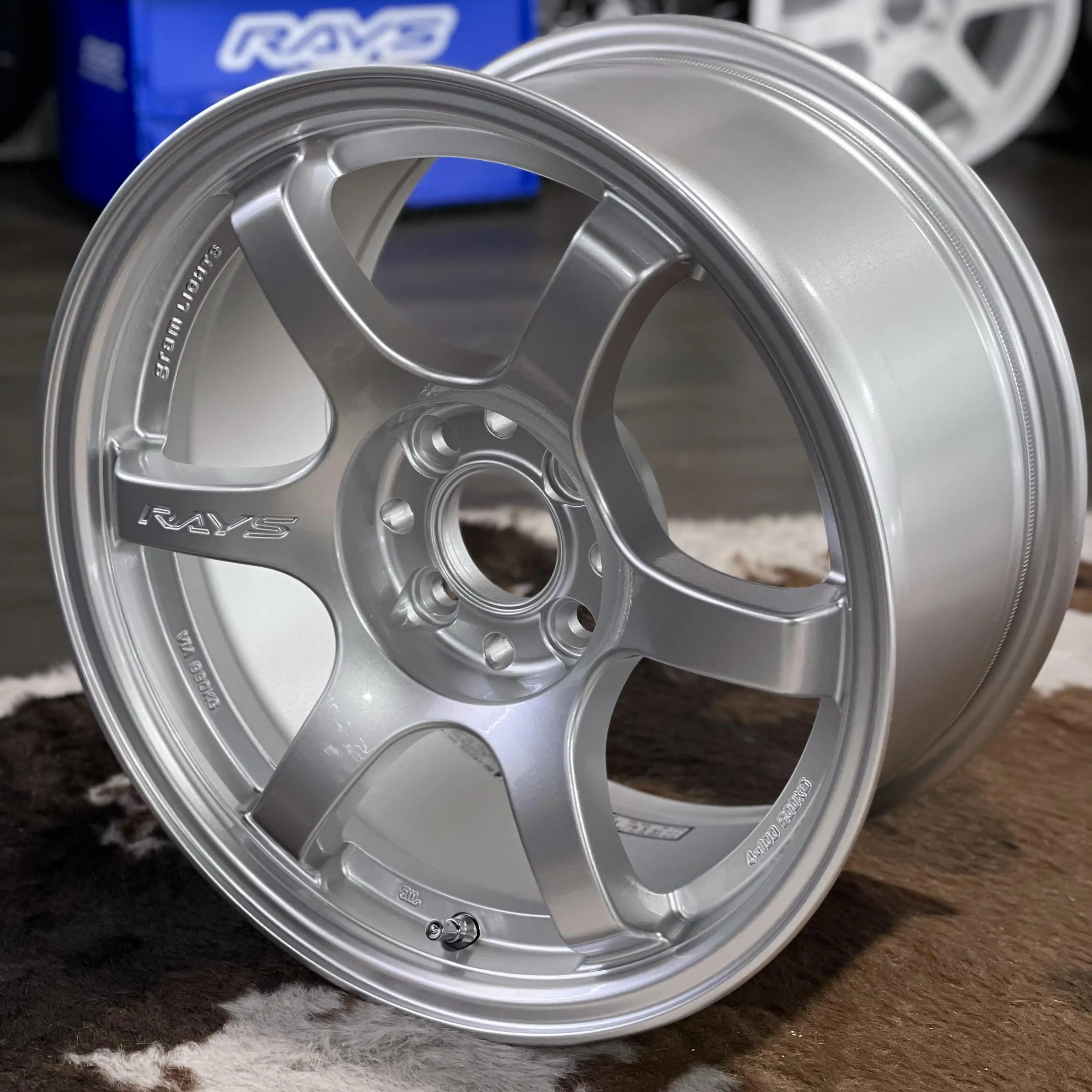 RAYS Gram Lights 57DR 15 inch 6 spoke wheel in bright Sunlight Silver SU finish