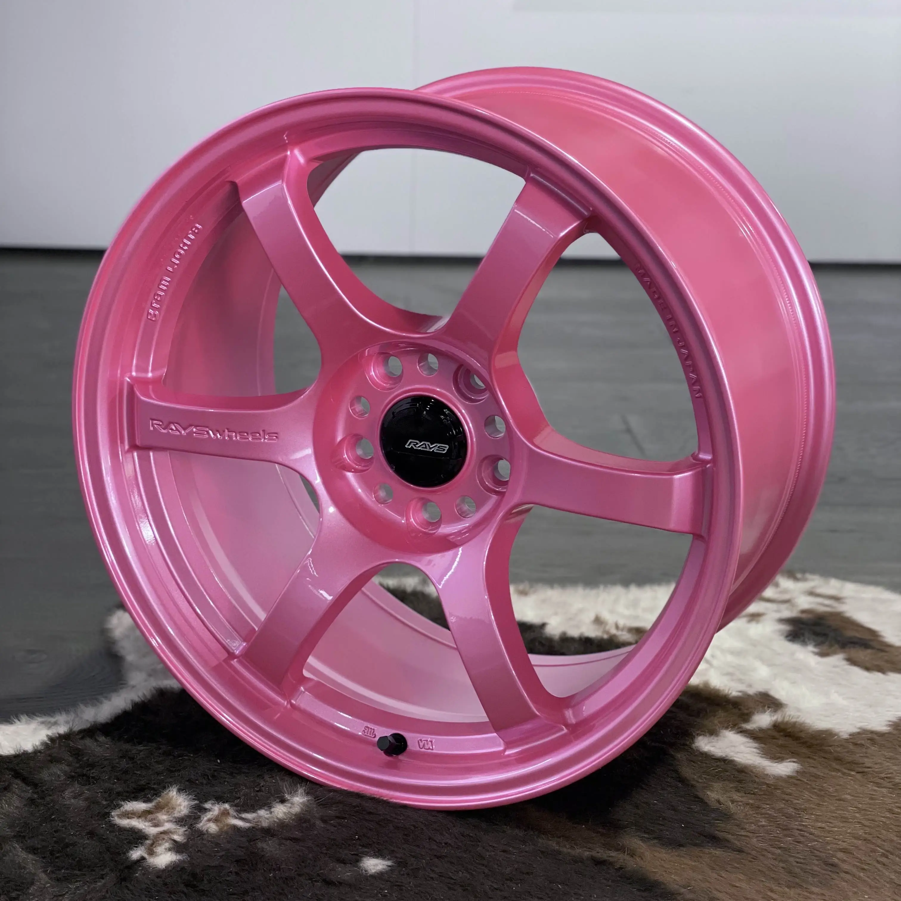 18 inch RAYS Gram Lights 57DR one piece sport wheel in the vibrant high gloss Sakura Pink finish