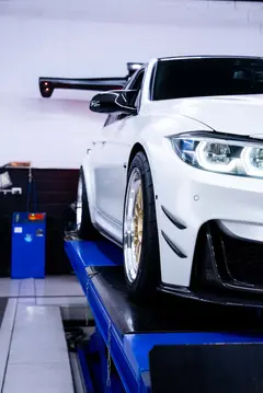 Clean direct side profile showing the contrast between Alpine White F80 M3 paint and Gold Volk 21A wheels