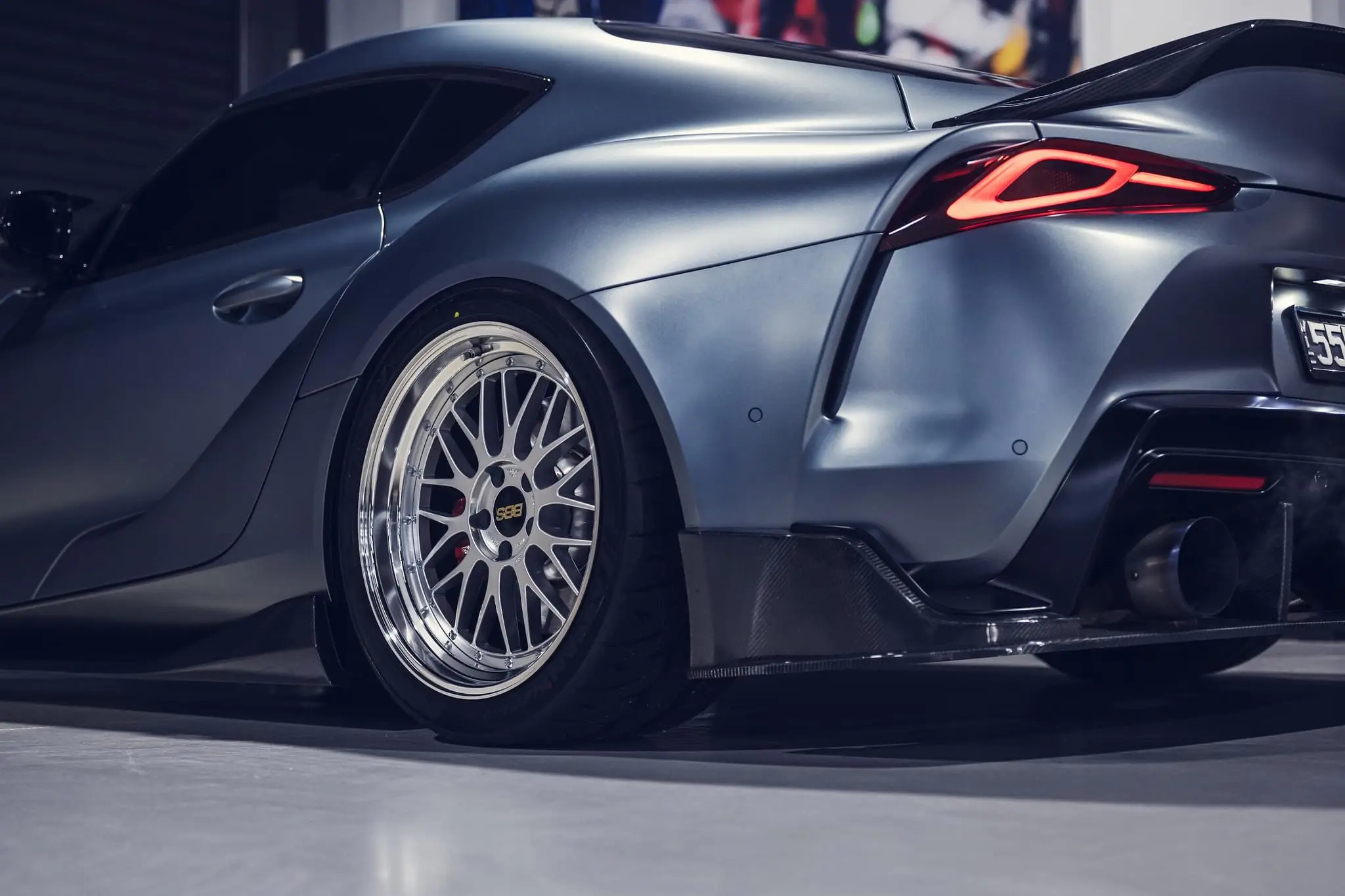 Toyota GR Supra A90 rear bumper profile showing flush guard alignment with BBS LM wheels