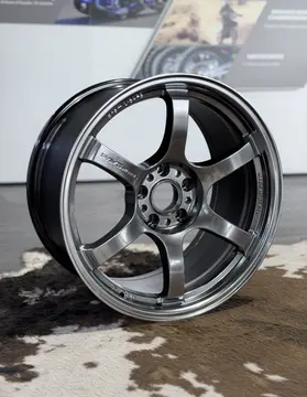 Studio display highlighting the bright shiny graphite undertones of the authentic RAYS Grace Silver paint finish under direct lighting