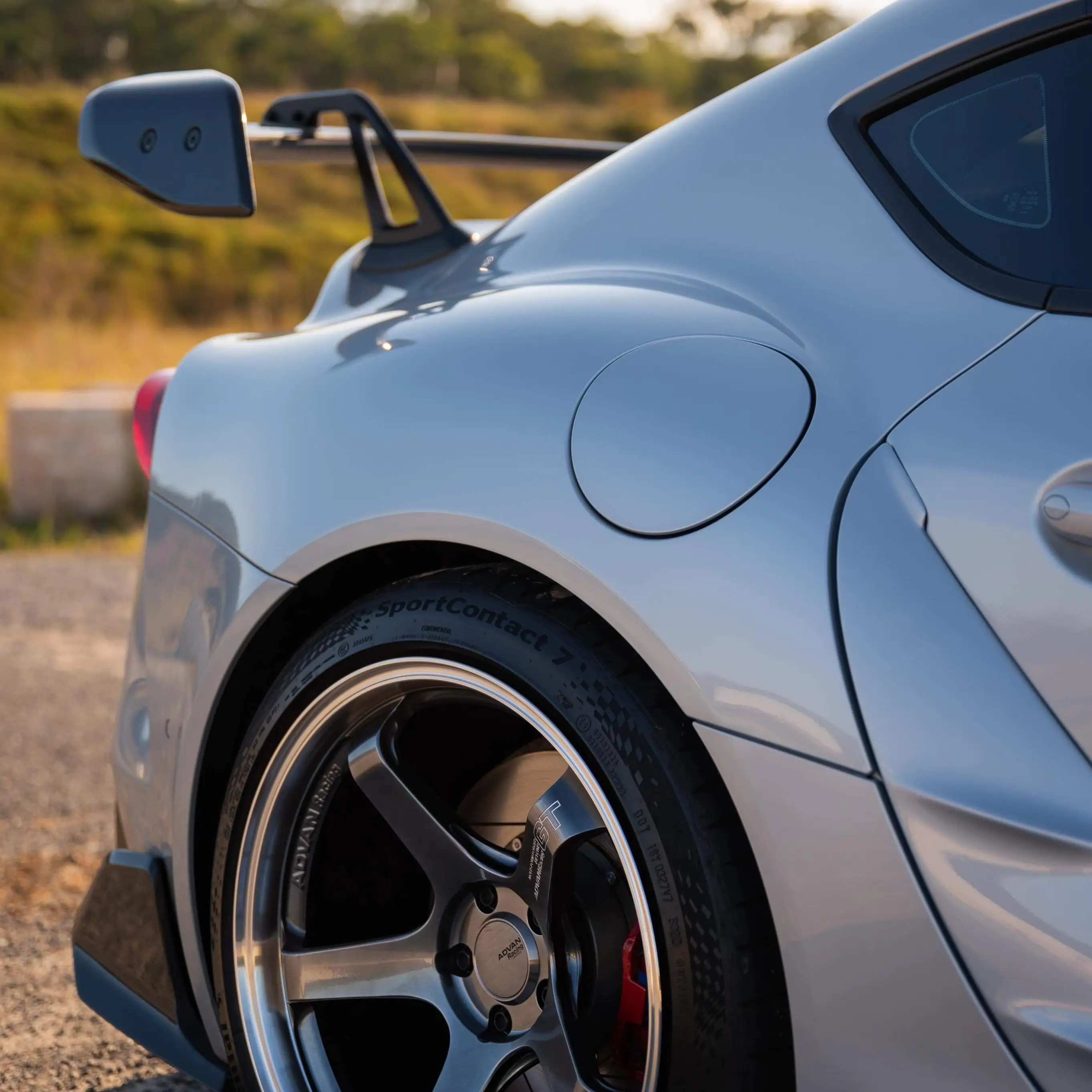 close up rear fender mk5 gr supra with 19 inch advan gt beyond wheel