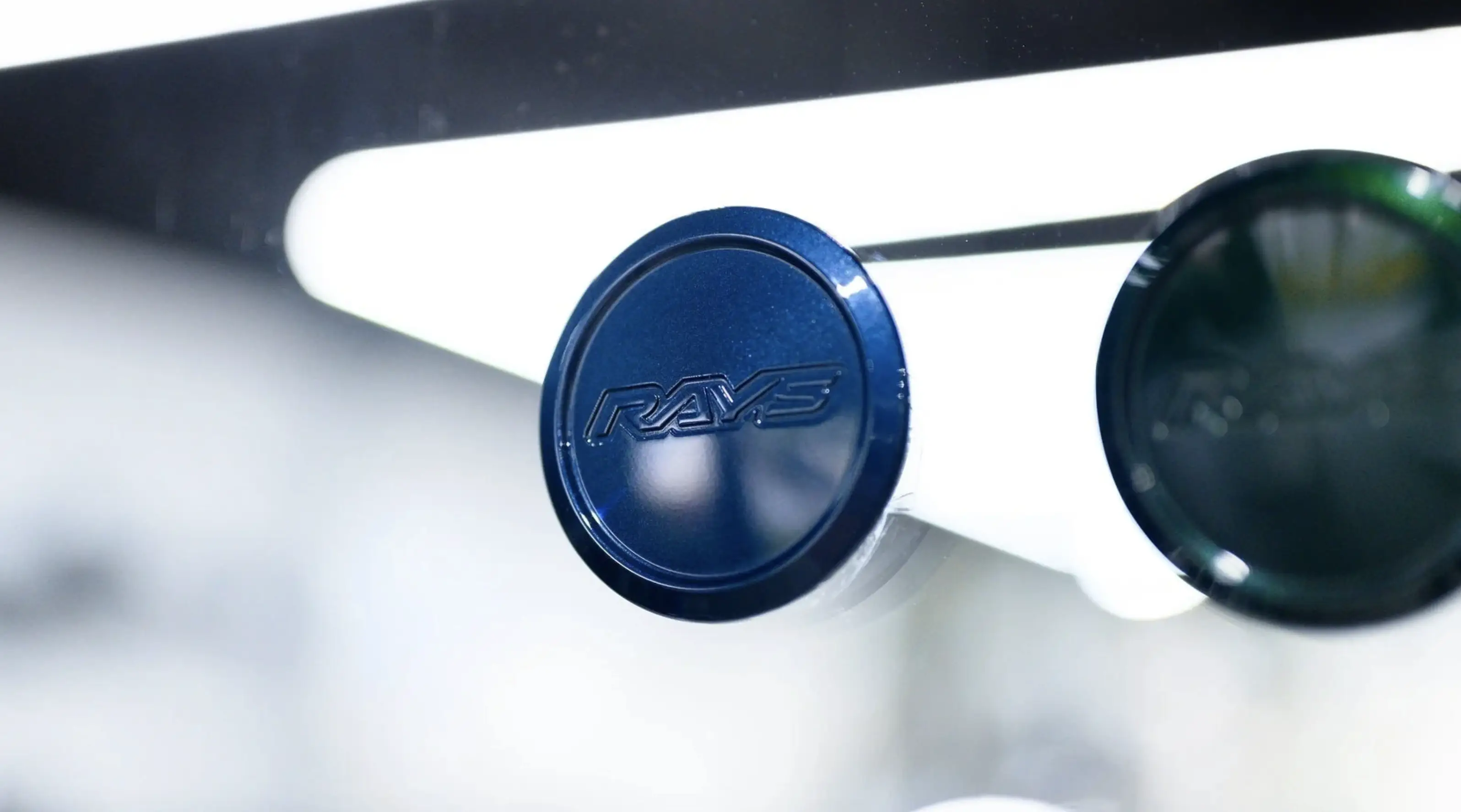 RAYS Volk Racing VR-01 Low Type center cap in Mag Blue BL on 18 inch TE37 wheel