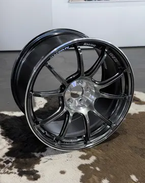 Detailed product shot focusing on the deep central hub area and swooping spoke lines of a standalone track spec wheel