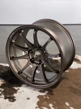 Side profile view showcasing the deep concave 10 spoke design of an 18 inch track spec Bronze CE28 N-Plus