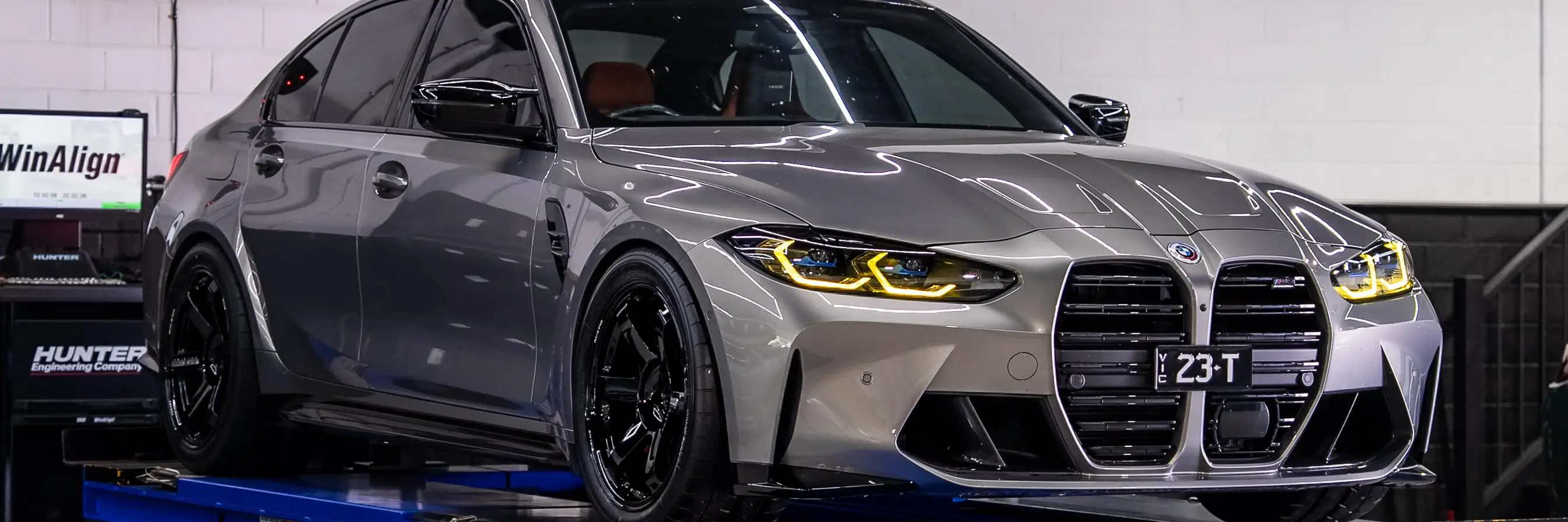 RAYS Volk Racing TE37 wheels in gloss black finish on a BMW G80 M3 sedan
