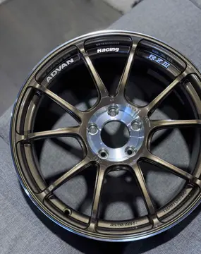 Three quarter studio view highlighting the deep concave GTR face spoke design of an Advan RZ3 wheel