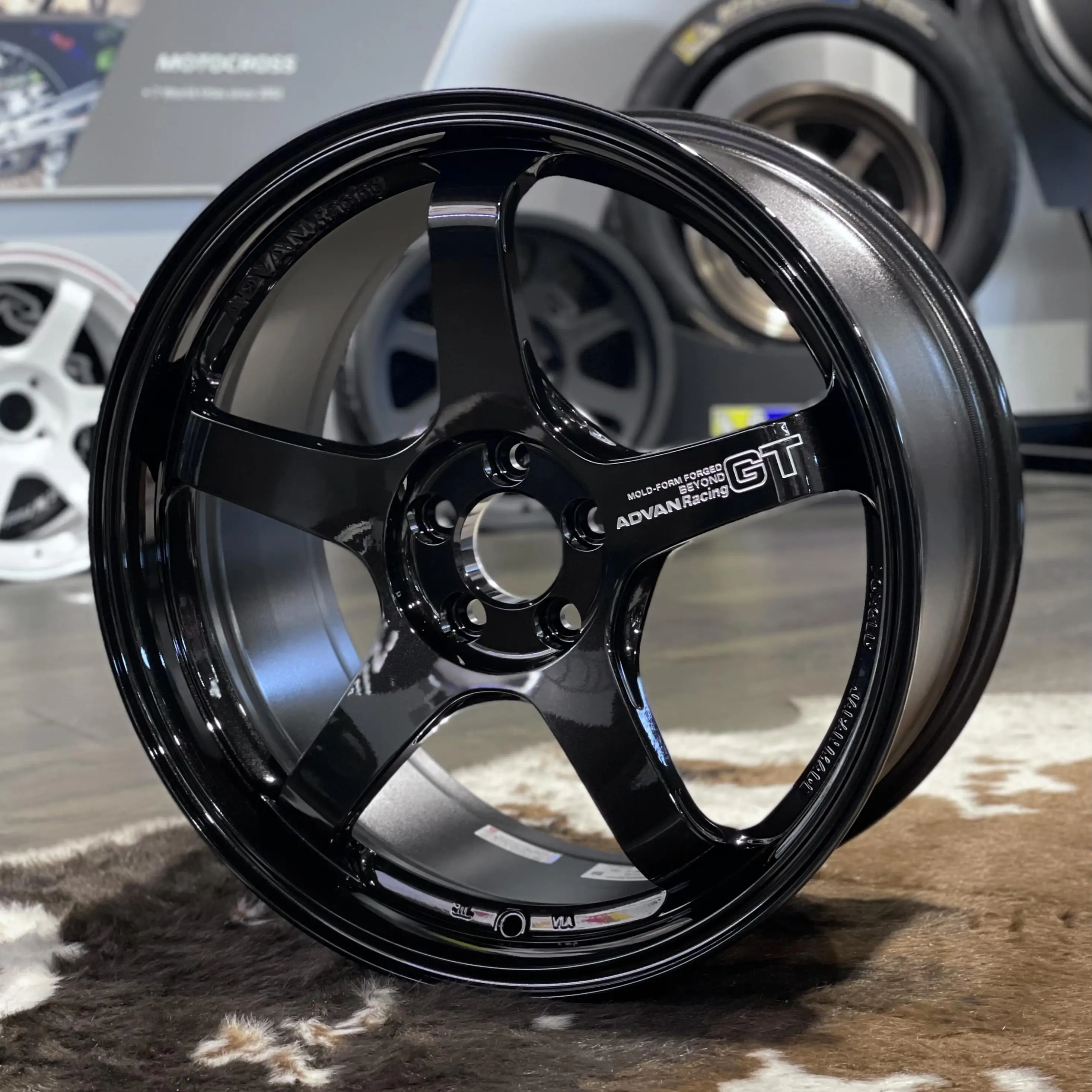 Premium Yokohama Advan GT Beyond forged monoblock wheel in the gloss Racing Titanium Black finish