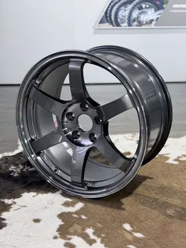 Studio product profile of an 18 inch RAYS Volk Racing TE37 Saga SL wheel in Pressed Graphite finish
