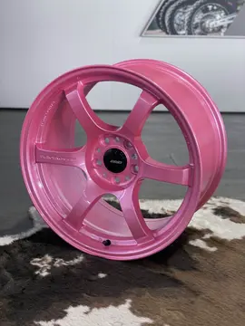 18 inch RAYS Gram Lights 57DR one piece sport wheel in the vibrant high gloss Sakura Pink finish