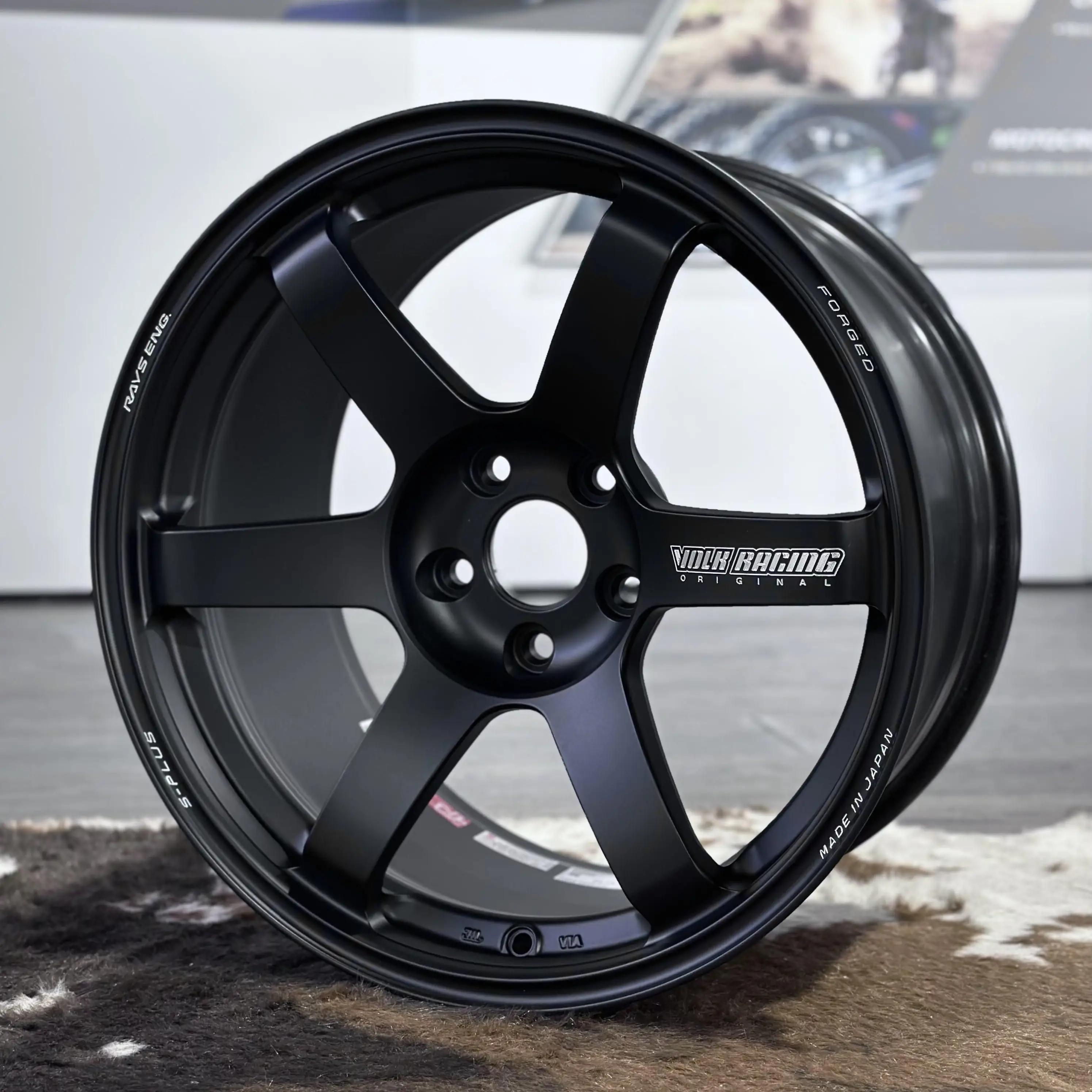 Front face view of RAYS Volk Racing TE37 Saga S-Plus wheel in matte black, 18x9.5 +22 5x114.3 spec for Toyota Gr Corolla
