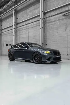 BMW F87 M2 showing side profile fitted with 19-inch RAYS Volk Racing ZE40 wheels in Diamond Dark Gunmetal - KA Autosport Australia