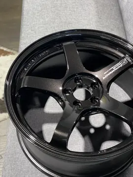 Macro shot of the central hub area illustrating the structural lug pockets and center drop on a TBK finish wheel