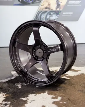 Three quarter studio view highlighting the thick concave five spoke layout of an RCB Advan GT Beyond wheel