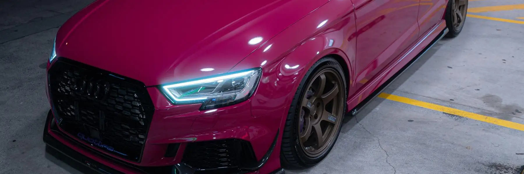 Ruby Star Pink Audi 8V RS3 Sedan side view fitted with Matte Gun Bronze RAYS Volk Racing TE37 SAGA SL wheels - KA Autosport Australia