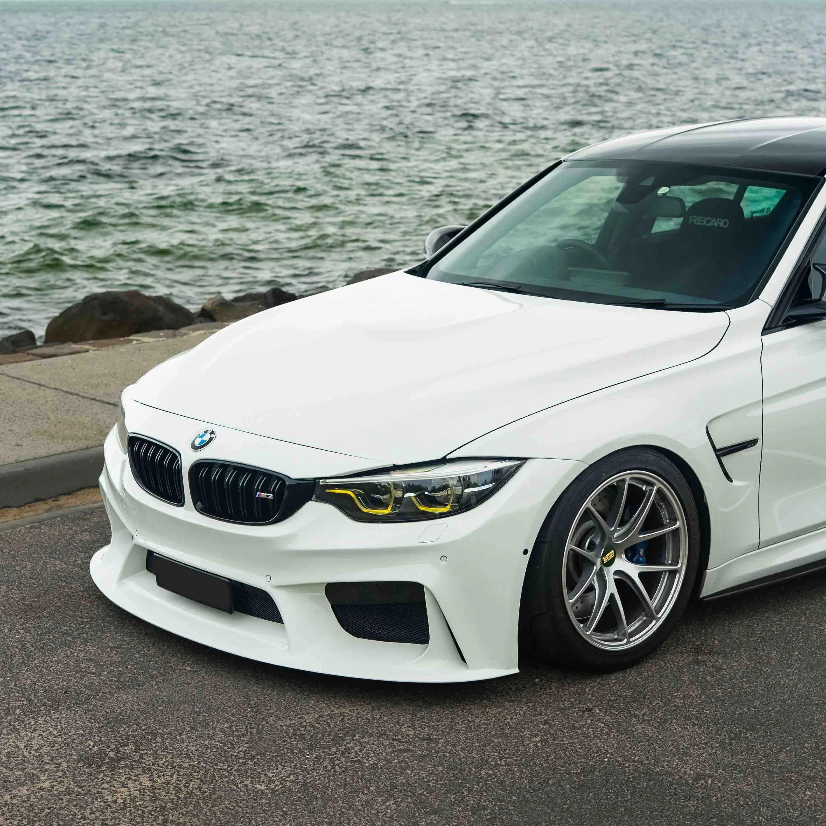 Close up of the split five spoke design on a Diamond Silver BBS RI-A clearing M3 brakes