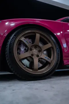 Spoke logo decal and machined rim detail on Matte Gun Bronze RAYS Volk Racing TE37 SAGA SL 5x112 wheel