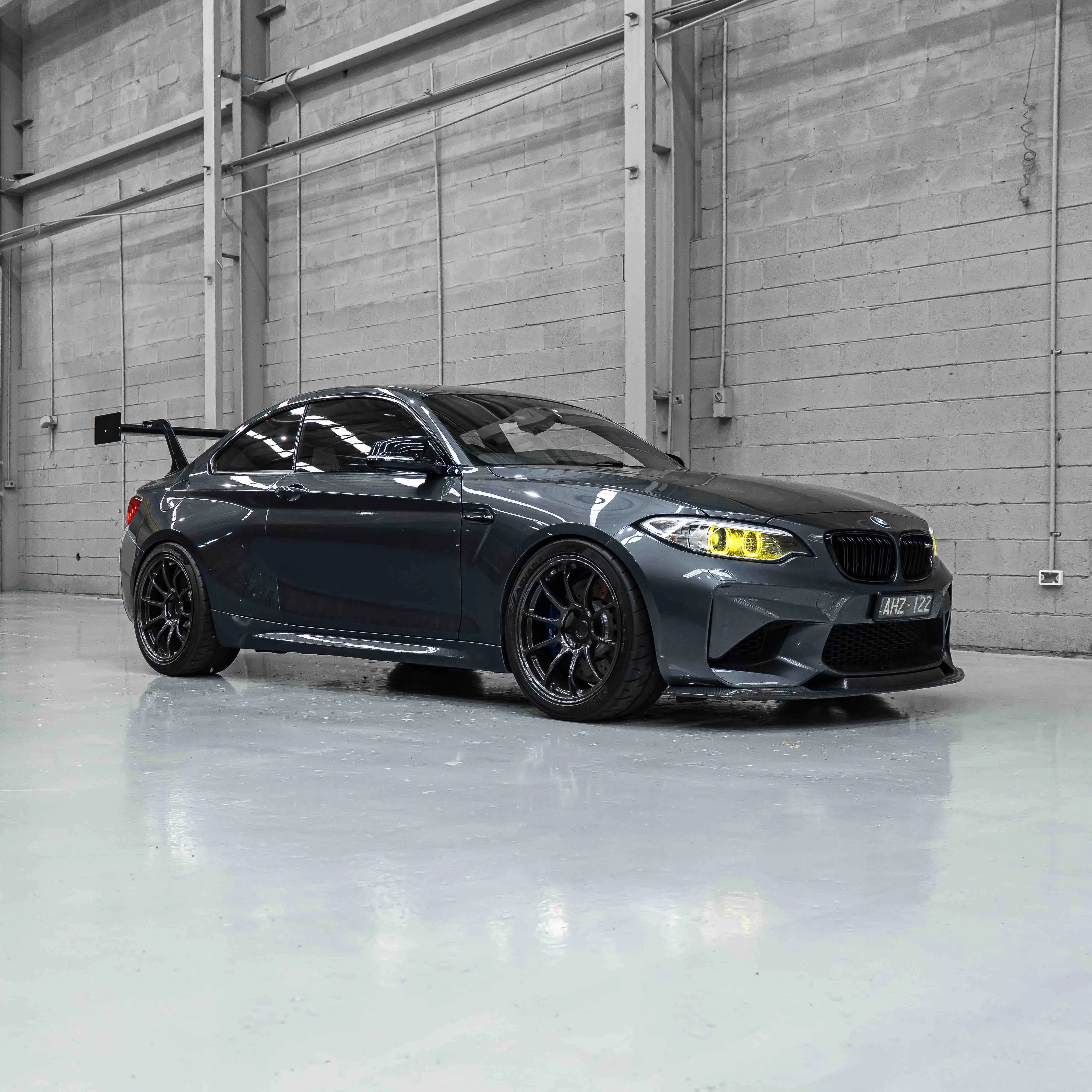 BMW F87 M2 showing side profile fitted with 19-inch RAYS Volk Racing ZE40 wheels in Diamond Dark Gunmetal - KA Autosport Australia