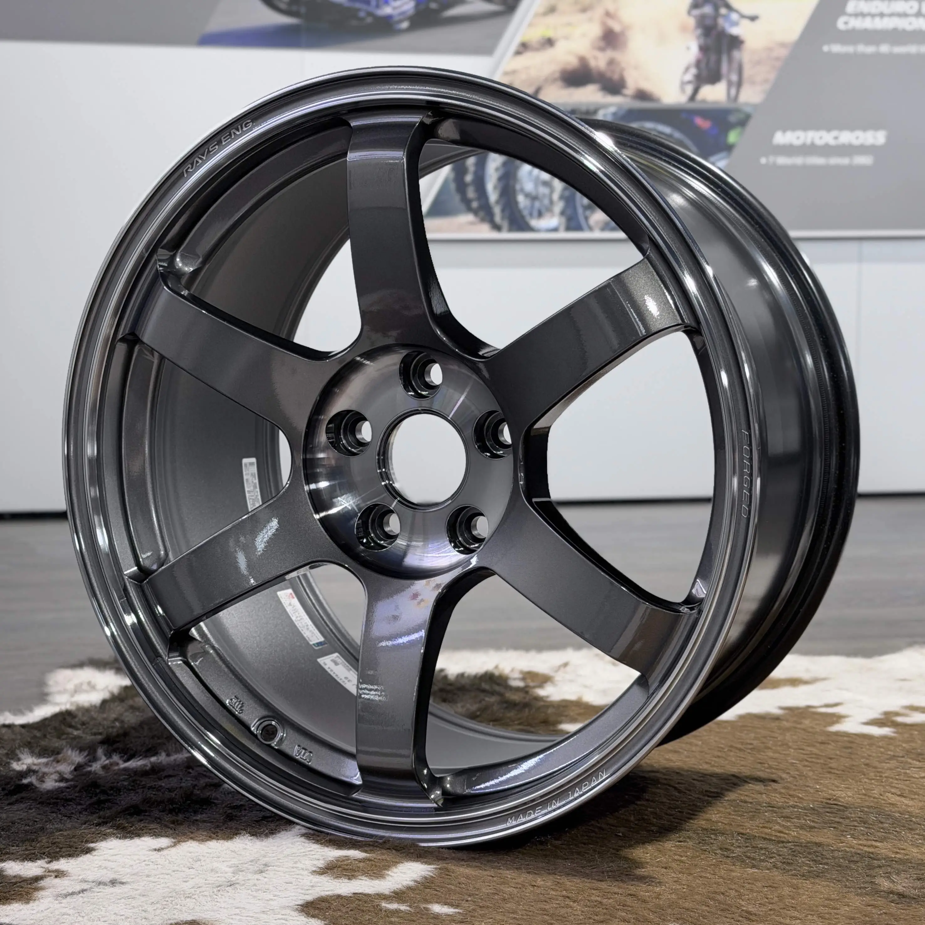 Three quarter perspective of an 18x9.5 Pressed Graphite TE37 Saga SL wheel showcasing face concavity