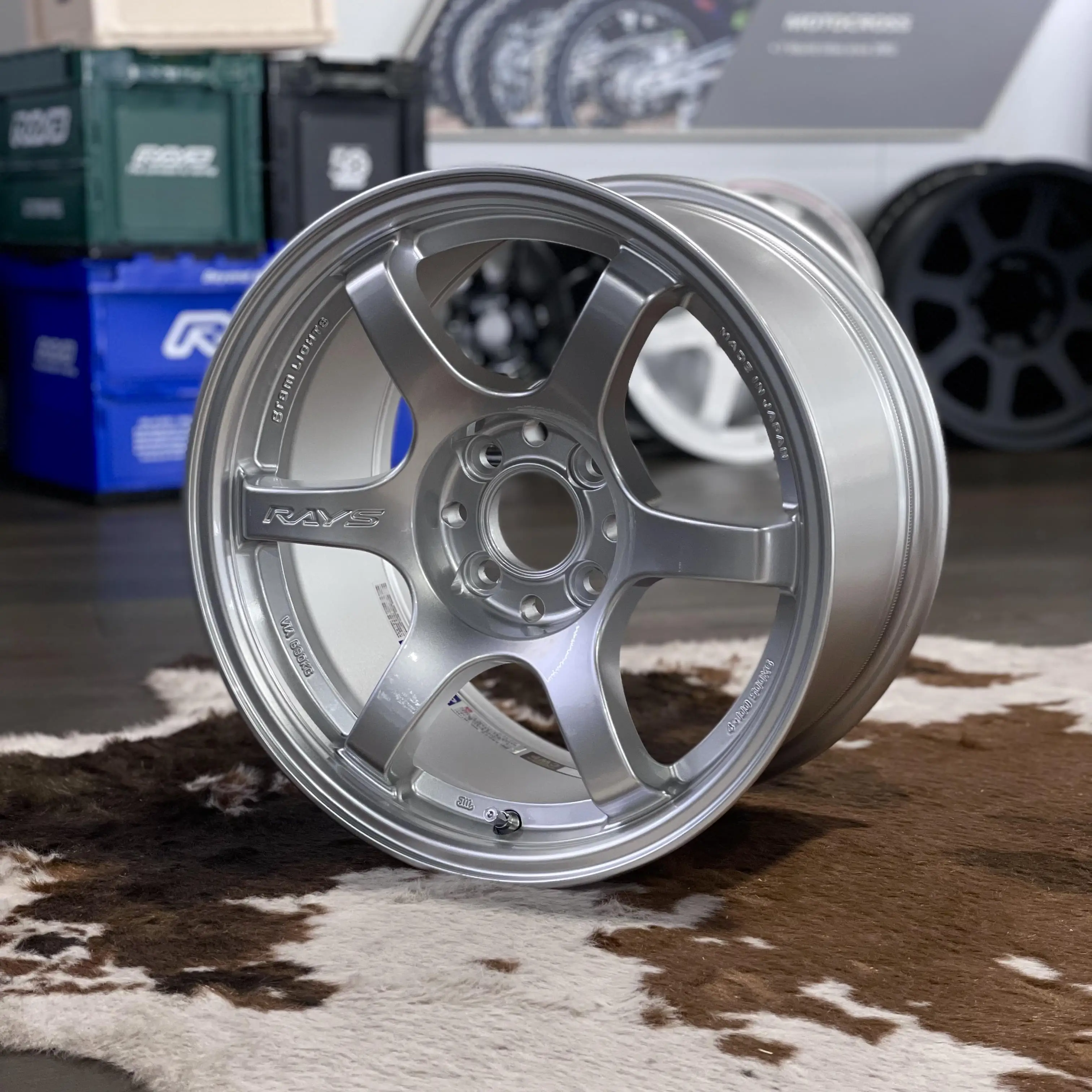 Three quarter view of 15 inch Gram Lights 57DR wheel showing deep concave spoke face
