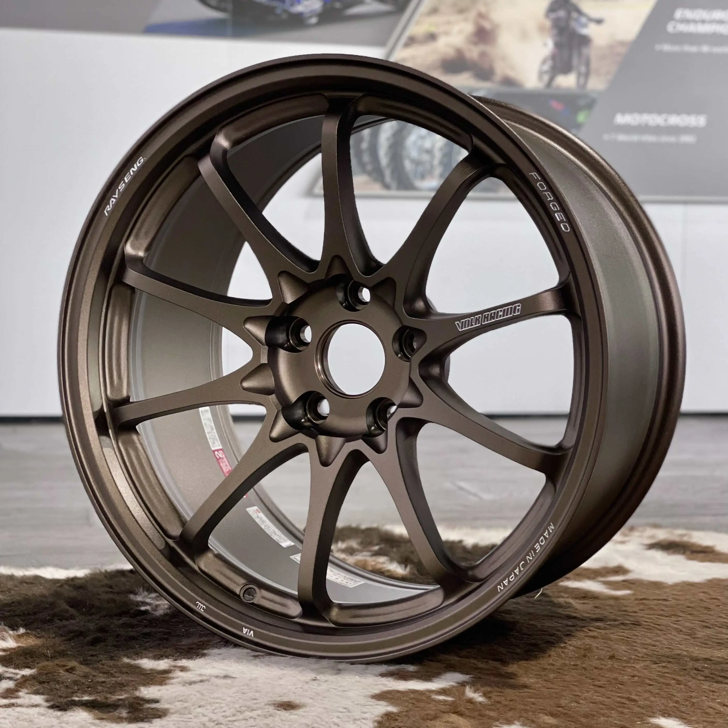Three quarter perspective highlighting the deep center drop of a Face 4 concave 18 inch CE28 N-Plus Bronze wheel
