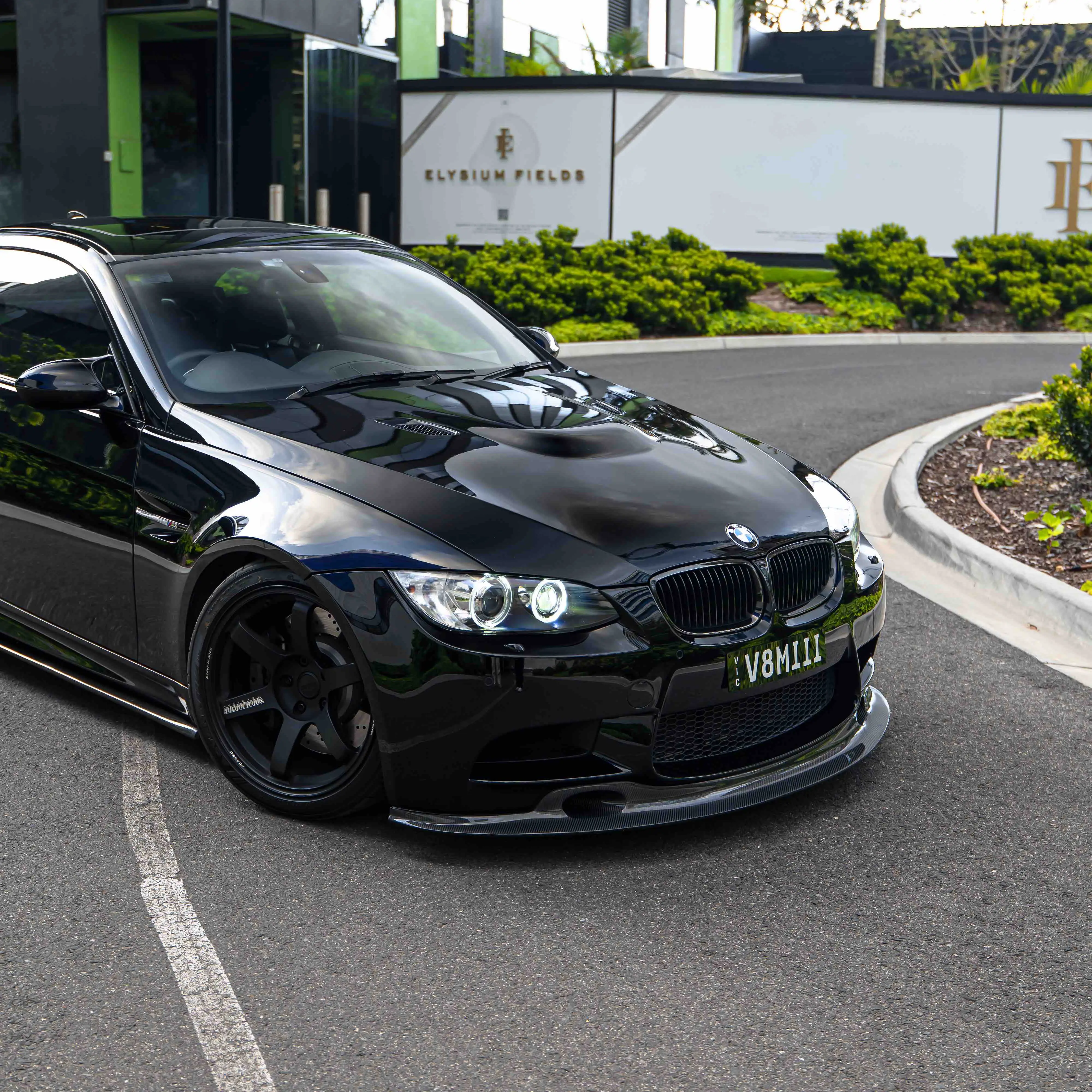 Black BMW E92 M3 in motion fitted with 18 inch Matte Black Volk Racing TE37 Saga S-Plus forged wheels