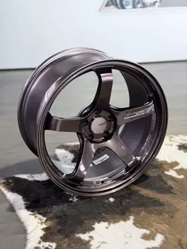 Side perspective emphasizing the unique barrel rim profile and deep outer lip step of a track ready Advan wheel
