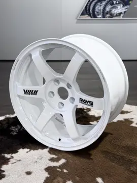Showroom showcase of the Japanese made 18 inch Volk Racing TE37 Saga SL in white with black OG volk stickers