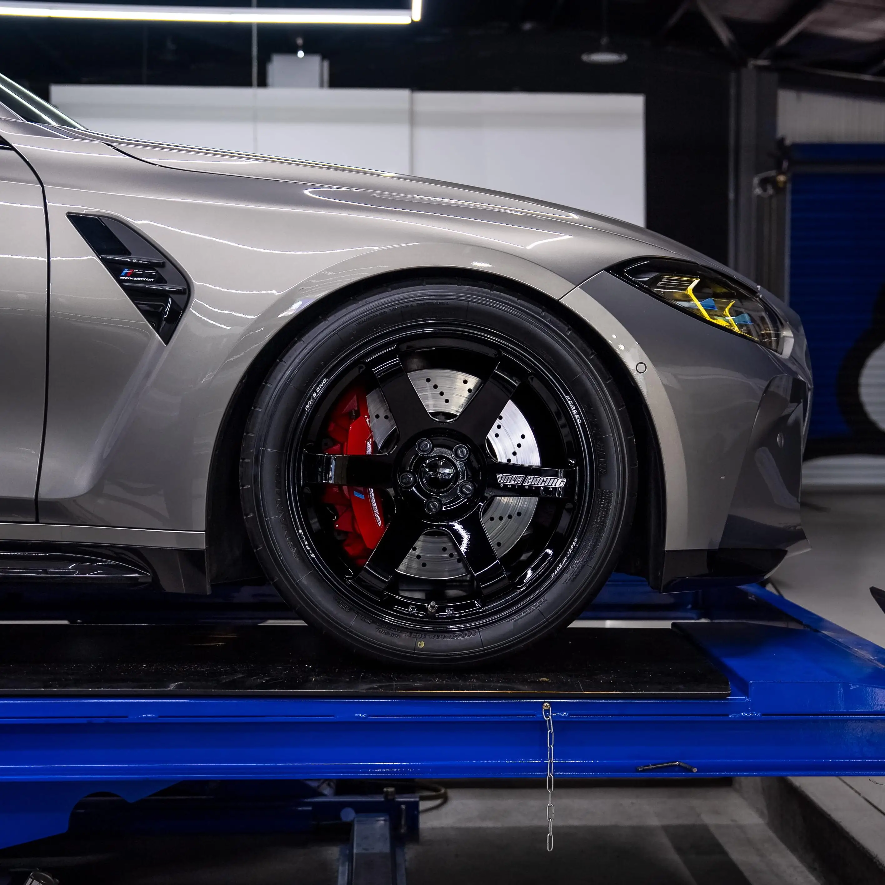 Authentic embossed rim barrel details on a gloss black 5x112 TE37 wheel mounted to a G80 M3