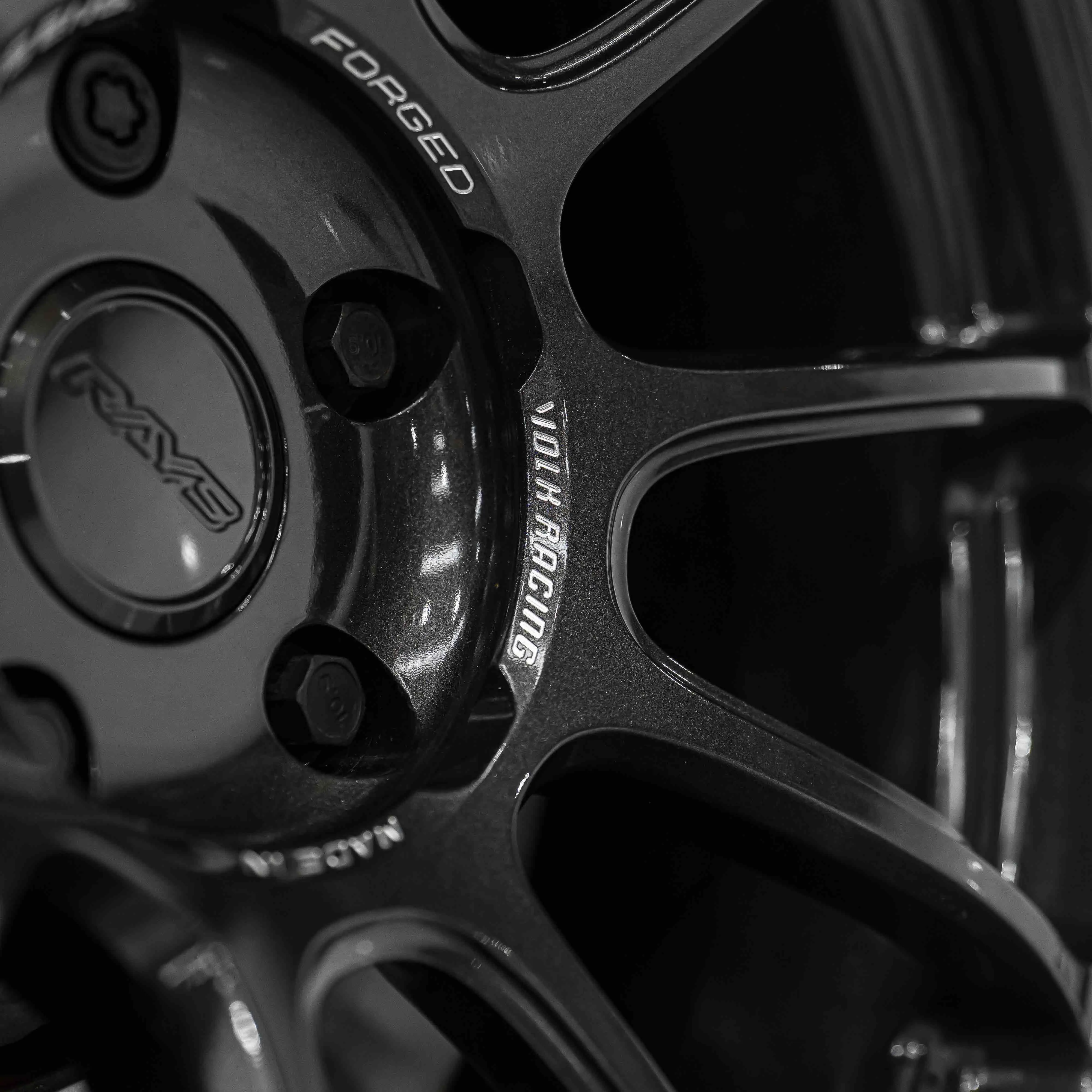 3D machined RAYS Volk Racing logo on 19-inch ZE40 Diamond Dark Gunmetal wheel spoke