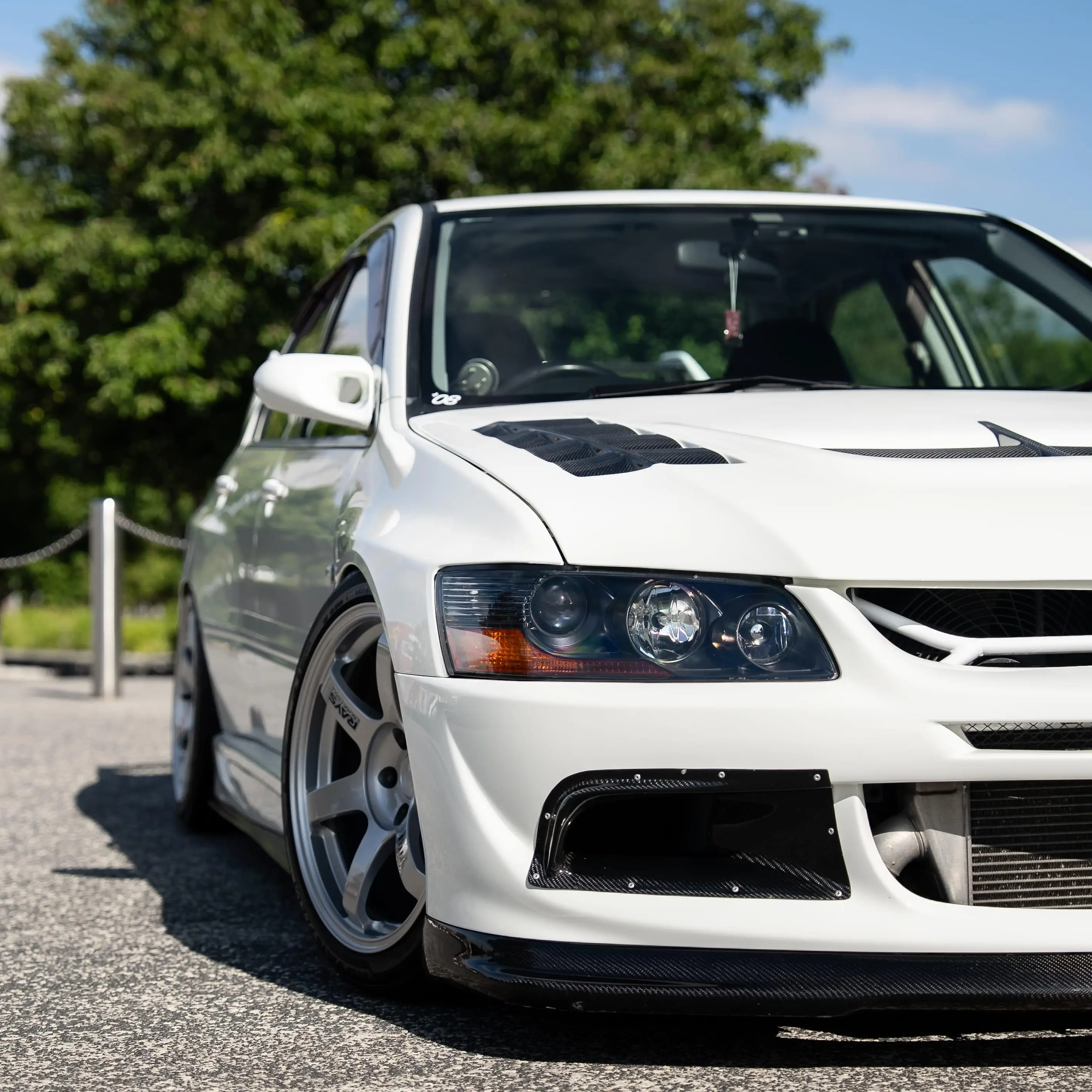 RAYS Volk Racing TE37 Saga SL Diamond Silver wheel fitment on a Mitsubishi Evolution 8 close up
