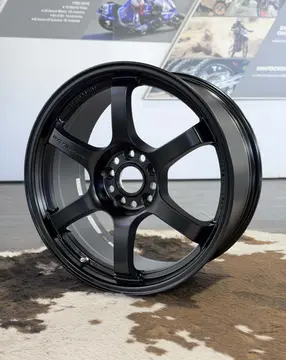 Three quarter studio view highlighting the aggressive six spoke design of an 18 inch 57DR wheel