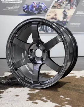 Three quarter perspective of an 18x9.5 Pressed Graphite TE37 Saga SL wheel showcasing face concavity