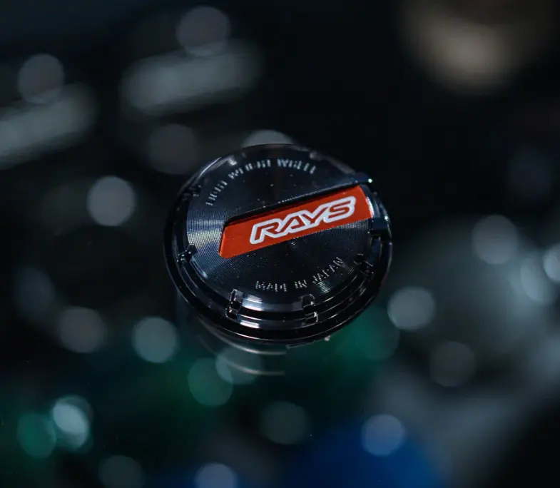 rays wheel caps black and red