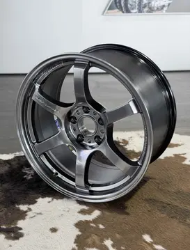 Side angle view illustrating the deep concave face of an 18 inch RAYS wheel