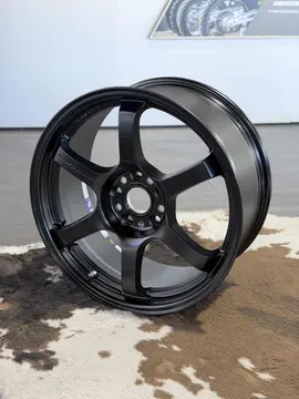 Side angle perspective illustrating the rigid stepped lip and clean barrel clearance on a Semi Gloss Black 57DR