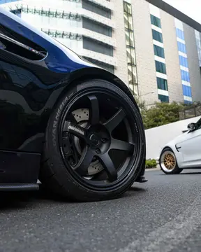 Rear quarter view showing deep concave face of 18 inch Volk TE37 Saga S-Plus in Matte Black on E92 M3