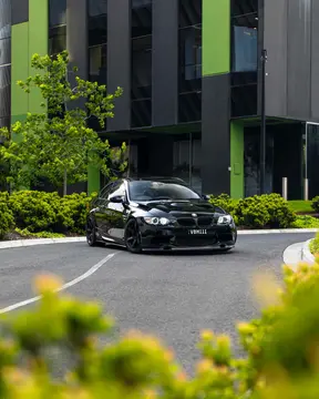 Black BMW E92 M3 in motion fitted with 18 inch Matte Black Volk Racing TE37 Saga S-Plus forged wheels
