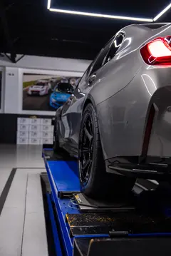 Track inspired BMW G80 M3 styling showcasing aggressive 5x112 gloss black TE37 wheels