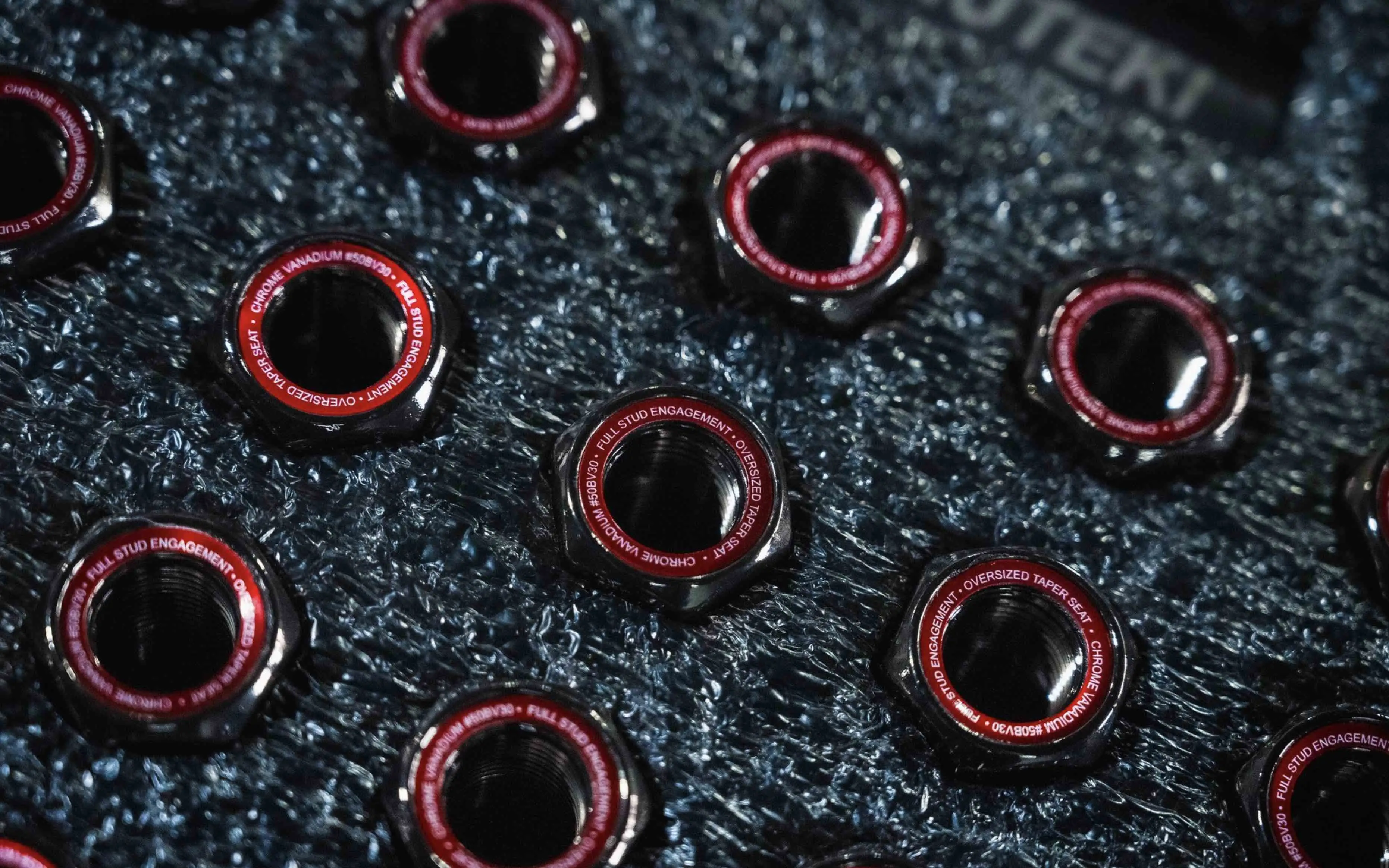 black chrome wheel nuts with red ring